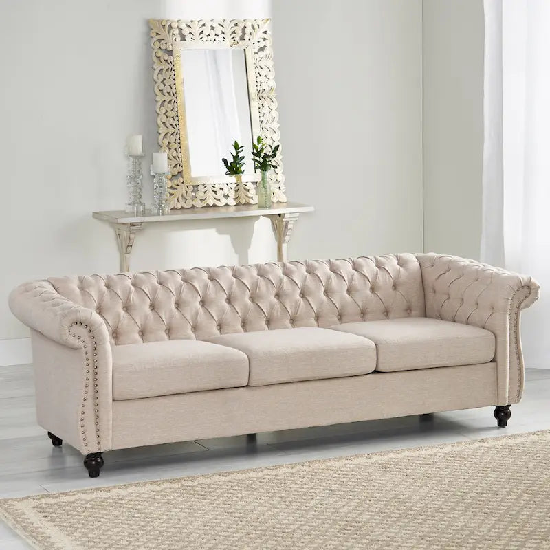 Beżowa trzyosobowa sofa Chesterfield z pikowaniem i nitami