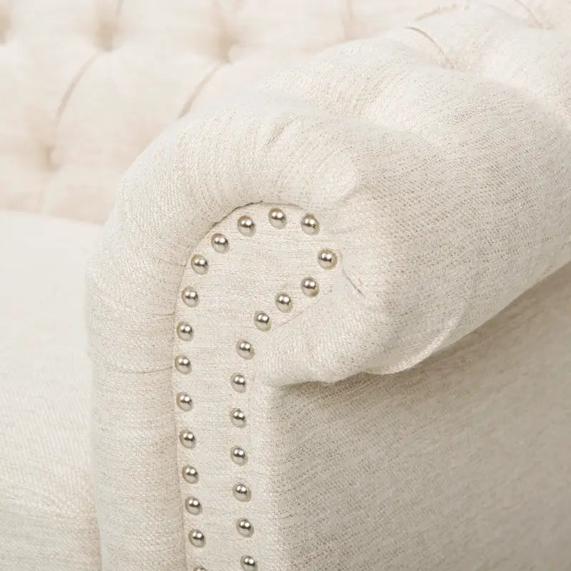 Beżowa trzyosobowa sofa Chesterfield z pikowaniem i nitami