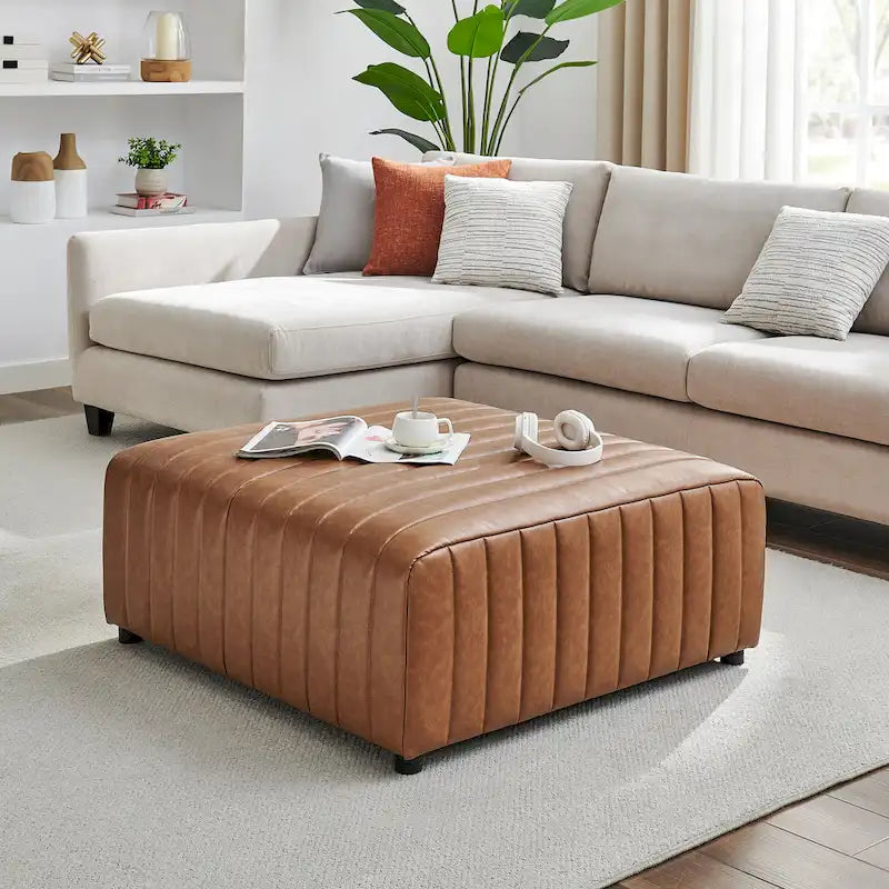 Table basse/ottomane carrée en similicuir Harland