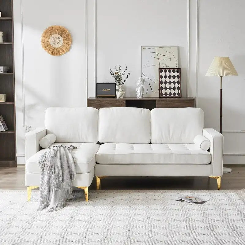 Trzyosobowa modułowa sofa pokojowa ze złotymi nóżkami trójnogami
