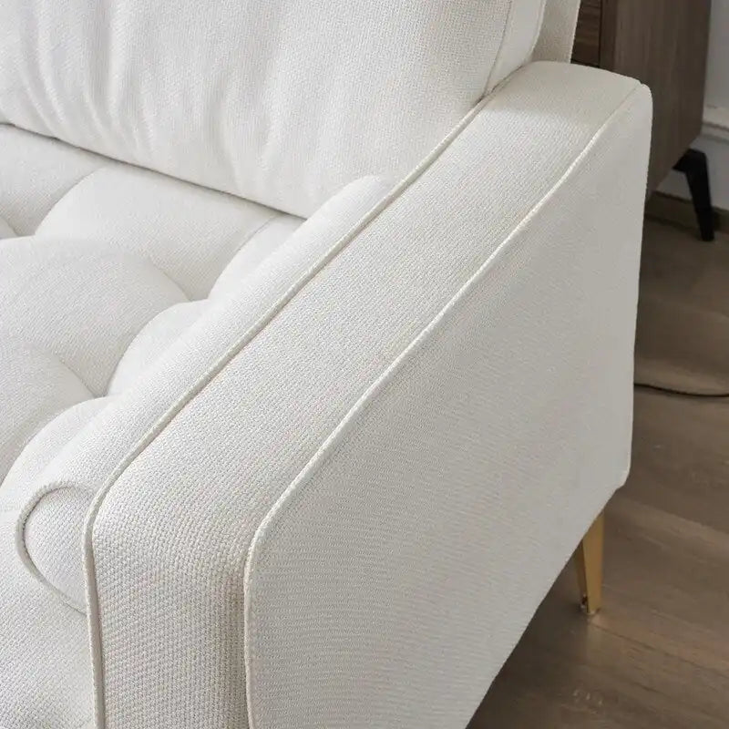 Trzyosobowa modułowa sofa pokojowa ze złotymi nóżkami trójnogami