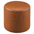 Le pouf rond en similicuir Barbossa de Curated Nomad