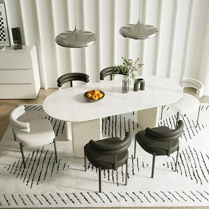 Table à manger ovale moderne en similicuir marbre crème avec base unique à 3 pieds