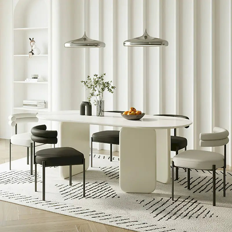 Table à manger ovale moderne en similicuir marbre crème avec base unique à 3 pieds