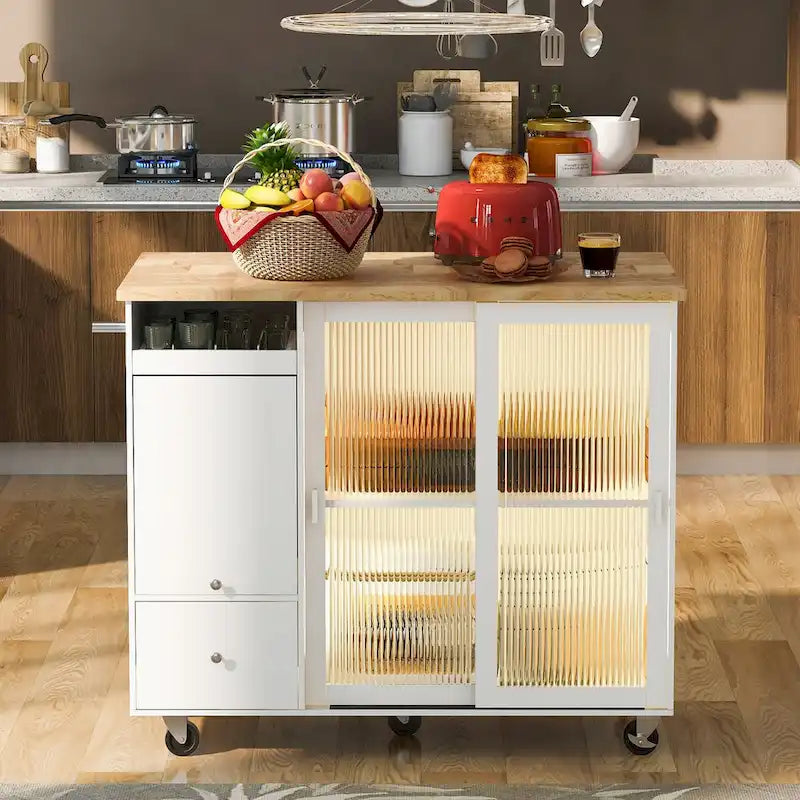 Wyspa kuchenna z opuszczanym blatem, oświetleniem LED, drzwiczkami z ryflowanego szkła, regulowaną półką, dwoma szufladami i kółkami