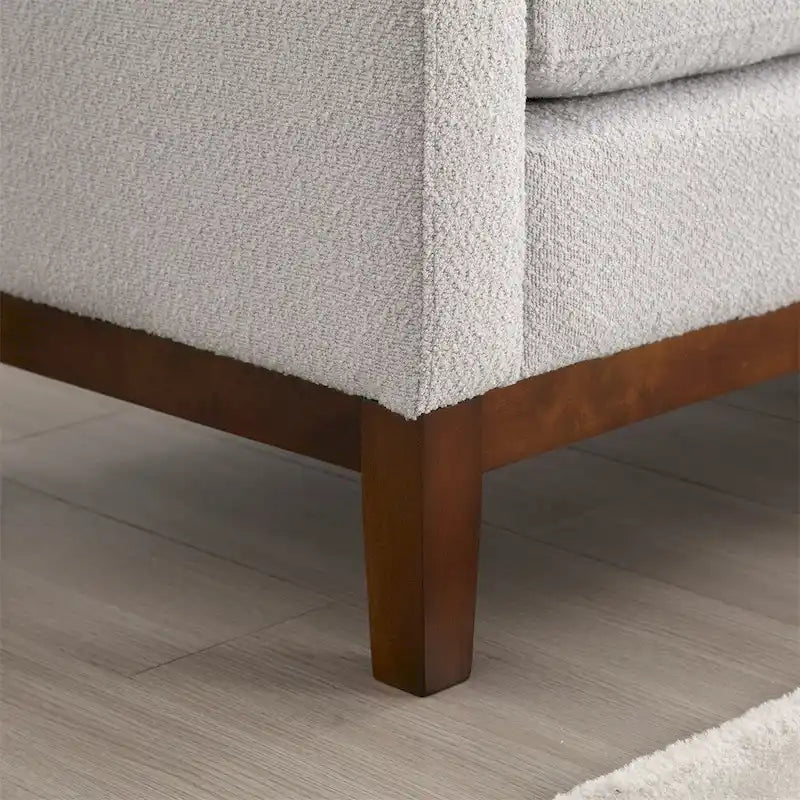 Banc rembourré élégant, pouf avec pieds en bois et coussins cylindriques
