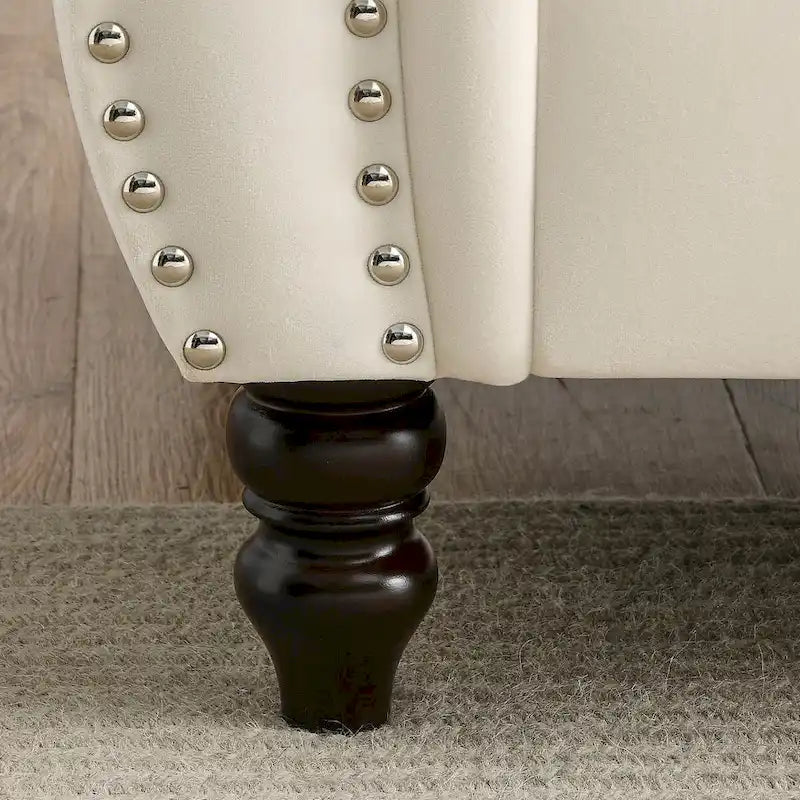 Beżowa welurowa sofa Chesterfield 3-osobowa, zaokrąglone podłokietniki, ozdobne nity