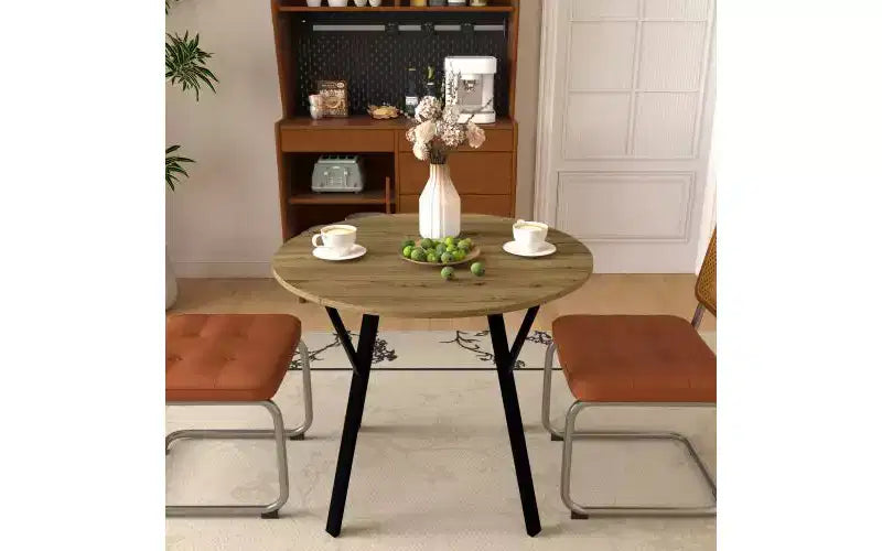 Table à manger ronde marron, pieds en métal, 2 places